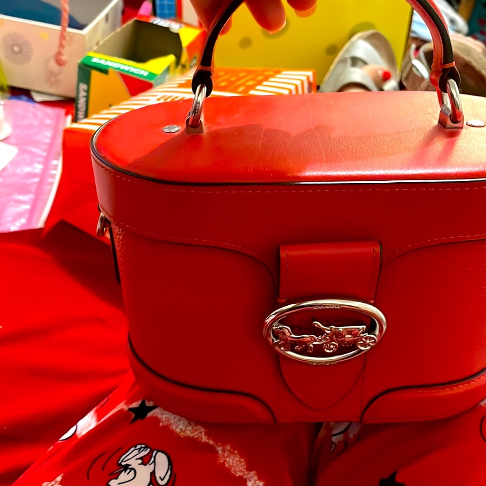 A beautiful red coach .